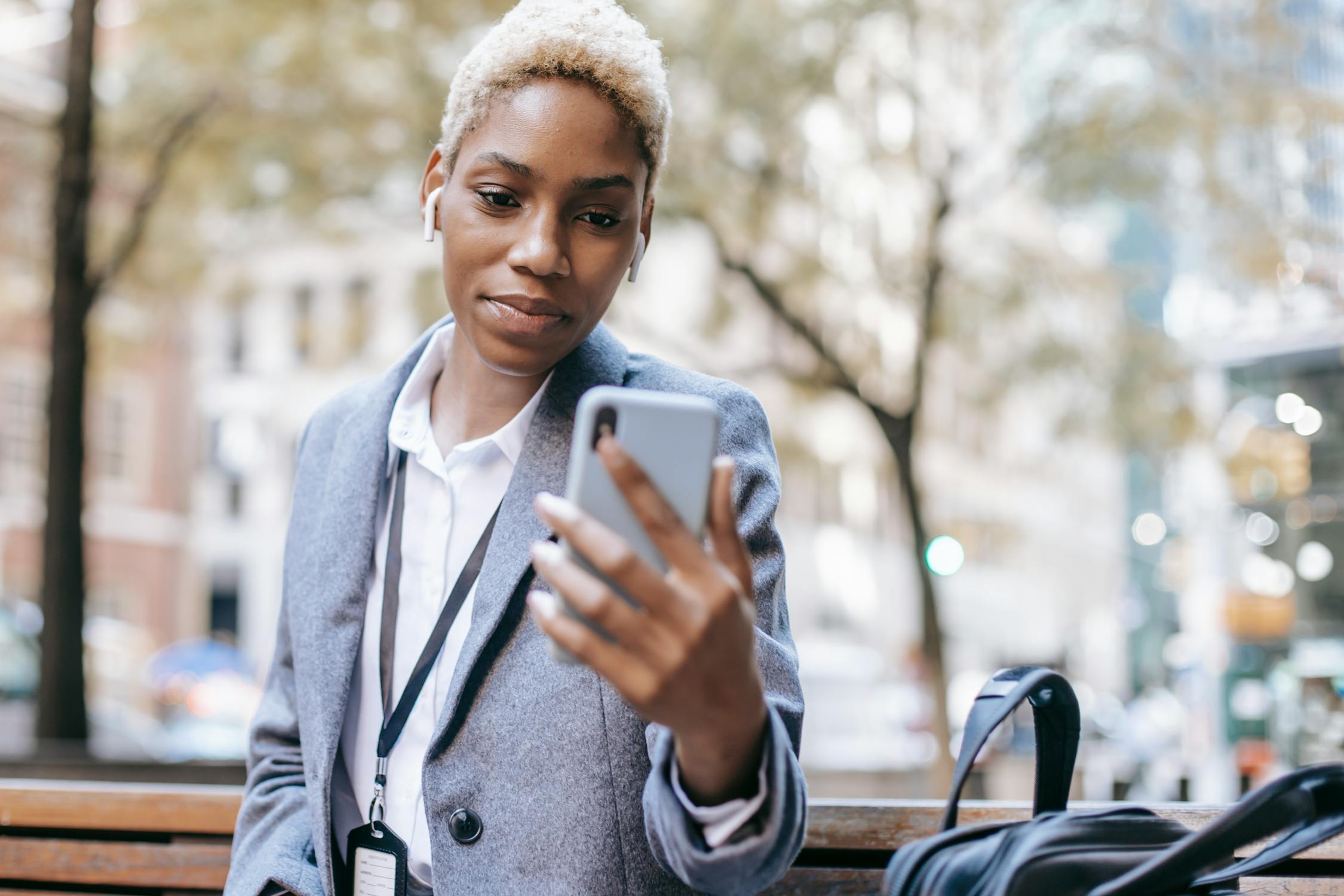 Woman checking an appointment reminder on her phone